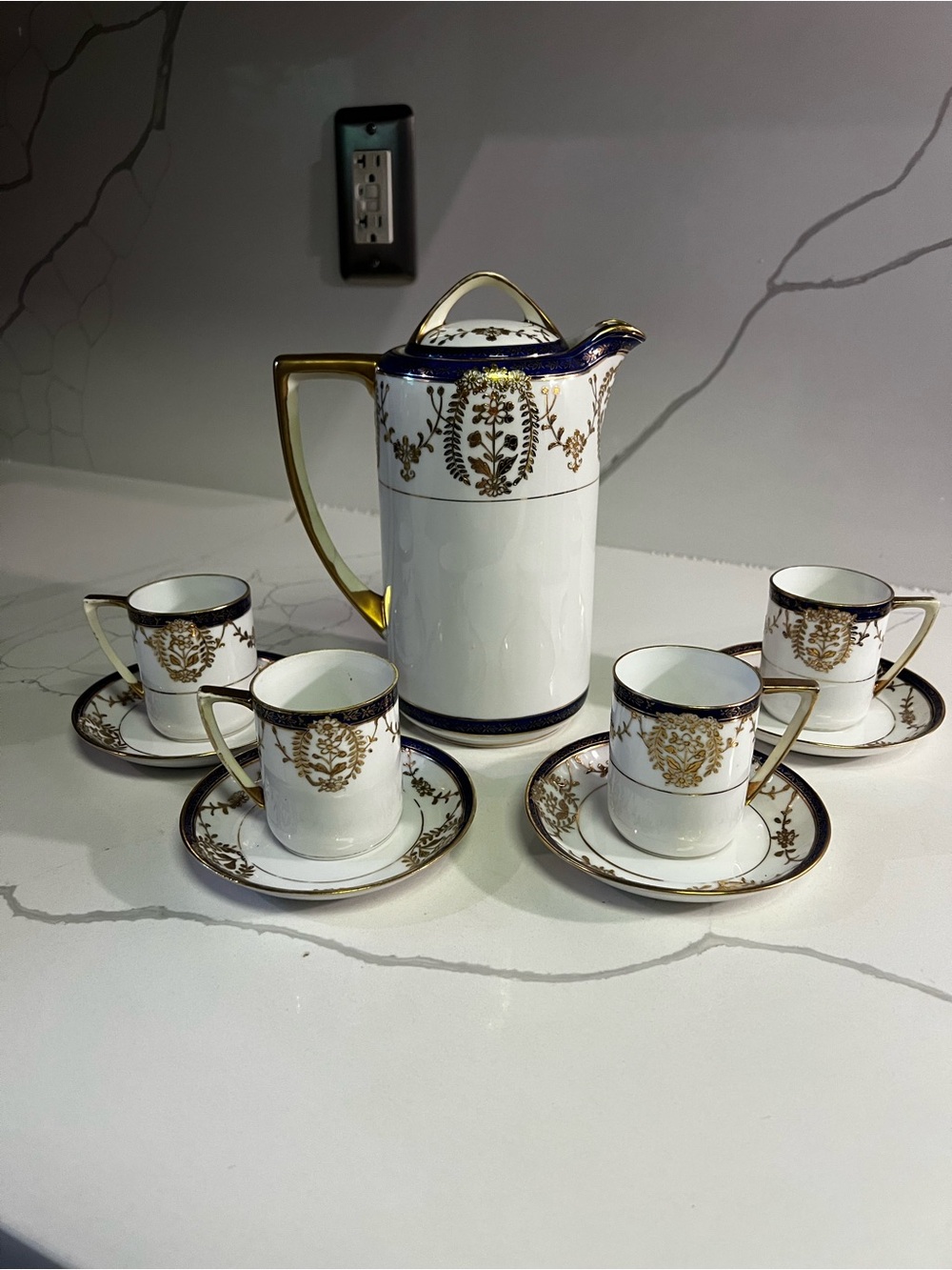 Elegant White Porcelain Coffee/Tea Set with Dark Blue and Gold Trim